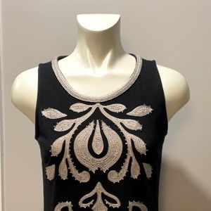 Unique sleeveless dress.